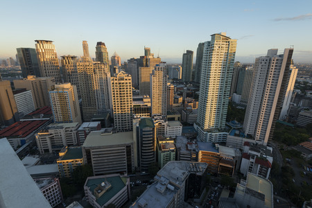 Manila, Philippines -February 23, 2016: Makati City Skyline at sunset . Makati City is one of the most developed business district of Metro Manila and the entire Philippines.のeditorial素材