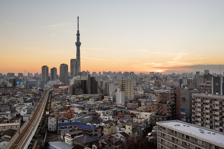 Tokyo; Japan -January 9; 2016: Tokyo Skyline at dusk, view of Asakusa district  Skytree visible in the distance.