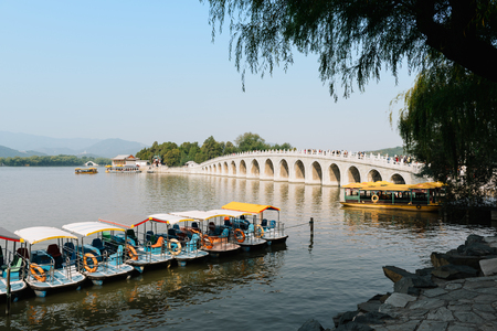 Beijing, China - October 19, 2015: Traditional Chinese Boats at Summer Palace in Beijing. The Summer Palace, is a vast ensemble of lakes, gardens and palaces in Beijing, China.の写真素材