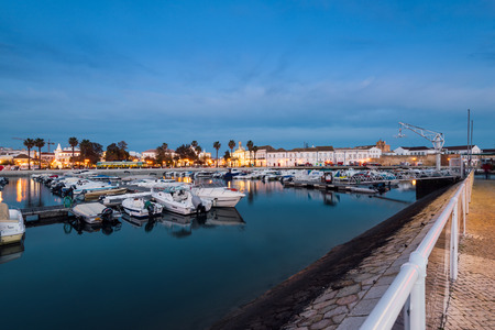 Faro - Portugal, April 1, 2018: Night view of the Old Town and the  Marina of Faro in Algarve,  Portugal.のeditorial素材