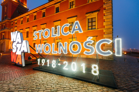 Warsaw, Poland - October 29, 2018:  Neon Sing installation in the Old of Warsaw.  Poland celebrating one hundred year anniversary of independence on 11th of November 2018. Neon sign  'Warsaw - the capital of freedom' (Warsaw, Poland).のeditorial素材