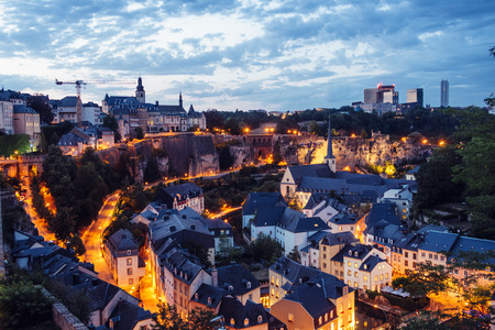 The Skyline of Luxembourg City at night.  The Old Town of Luxembourg is a UNESCO World Heritage Site. Neumünster Abbey, the banks of the Alzette River in the lower city, known as the Grund Quarter.のeditorial素材