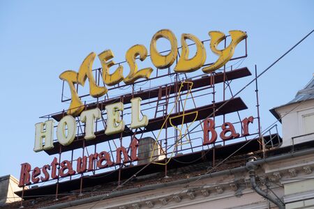 Cluj Napoca, Romania - 24 Oct, 2019: Decotative neon signs of a hotel, a bar and a restaurant in Cluj Napoca, Romania.のeditorial素材