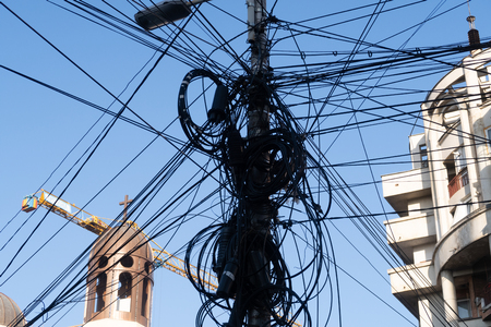 Cluj Napoca, Romania - 24 Oct, 2019: Messy electrical cables  in Cluj-Napoca, Romania.のeditorial素材