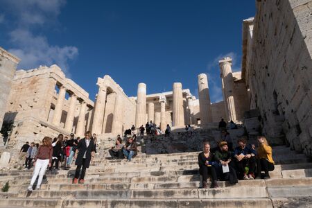 Athens, Greece - Dec 20, 2019: Tourists at the entrance to the Acropolis in Athens.のeditorial素材