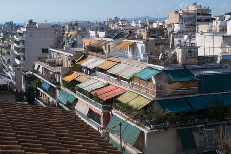 Athens, Greece - Dec 20, 2019: View of Athens from Acropolis with mass of houses, buildings,...