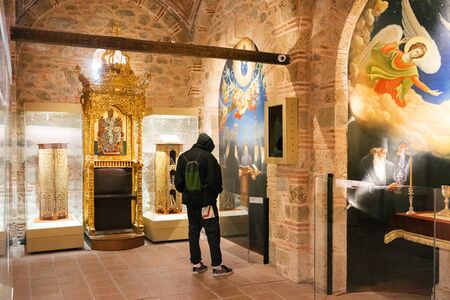 Meteora, Greece - Dec 16, 2019: Visitors inside the Museum of the Varlaam Monastery in Meteora, Greece.のeditorial素材