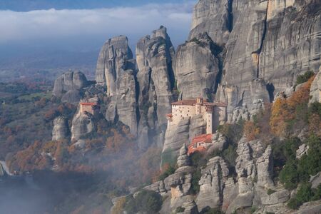 Meteora, Greece - Dec 19, 2019:  Monastery of Moni Agias Varvaras Roussanou and the spectacular massive rocky pinnacles of Meteora, Thessaly, Greeceのeditorial素材