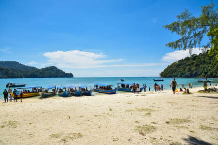 Langkawi Island, Kedah, Malaysia : 28th December 2020 - Landscape view of passengers boats at the beach.のeditorial素材