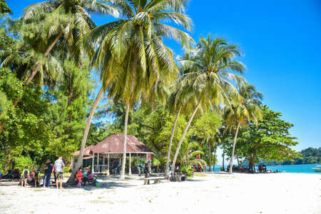 Langkawi Island, Kedah, Malaysia : 28th December 2020 - Situation on the beach with many tourist to holiday and beautiful nature view.のeditorial素材