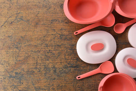 Pahang, Malaysia : 18th October 2020 - Tupperware serving set with wood table backgroundのeditorial素材