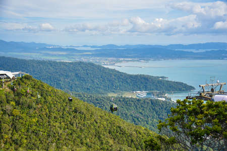 Langkawi, Kedah, Malaysia : 27th December 2020 - View of cable car just arrived at station with beautiful nature view.のeditorial素材