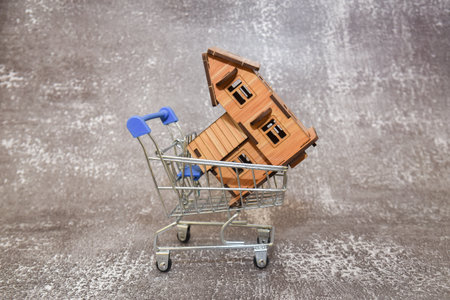 Real estate house model in trolley.の写真素材