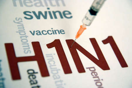 Swine flu H1N1 disease with syringe  and virus vaccine の写真素材