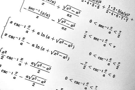 Large number of mathematical formulas on a white backgroundの写真素材