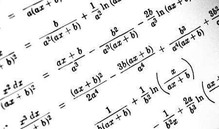 Large number of mathematical formulas on a white backgroundの写真素材
