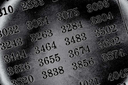 Black background with many numbers neon in perspectiveの写真素材