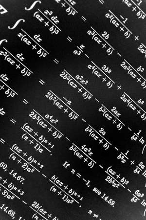 Large number of mathematical formulas on a black background
