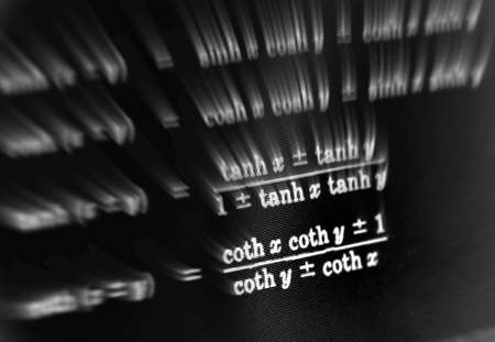 Large number of mathematical formulas focus zoom on a black background