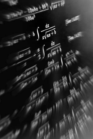 Large number of mathematical formulas focus zoom on a black backgroundの写真素材