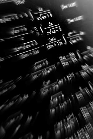 Large number of mathematical formulas focus zoom on a black background