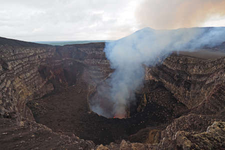 The active volcano in Masaya Volcano National Park, Masaya, Nicaragua i early afternoon light.の写真素材