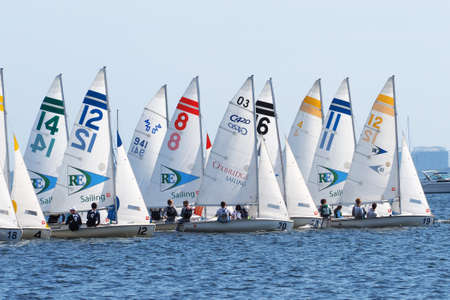 Miami, Florida 01-09-2015 Sailboats in a high school regatta in Biscayne Bay on a sunny winter day.