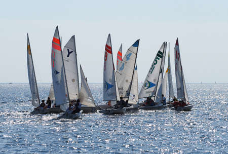 Miami, Florida 01-09-2015 Sailboats in a high school regatta in Biscayne Bay on a sunny winter day.