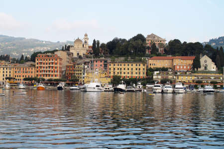 Santa Margherita Ligure, Italy 04-12-2011 Waterfront buildings of Santa Margherita reflected in the calm waters of the harbor on the Italian Riviera.のeditorial素材