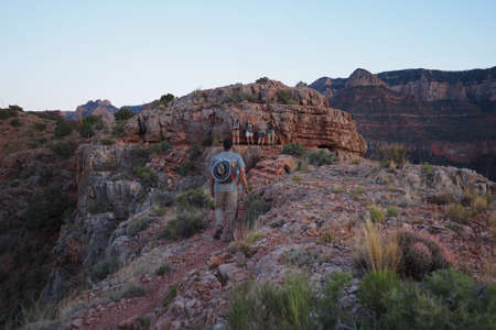 Grand Canyon National Park, Arizona 05-23-2016 Hikers returning to camp after sunset on Horseshoe Mesa.のeditorial素材