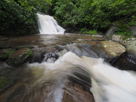 Yellow Creek Falls near Robbinsville, North Carolina, flowing strongly after heavy summer rains.の写真素材