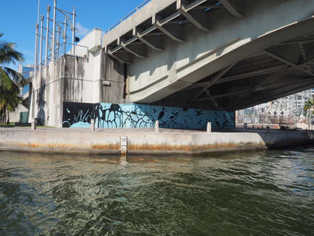 Miami, Florida 03-01-2019 The Miami River and surrounding residential and commercial buildings on a clear and sunny March afternoon.のeditorial素材