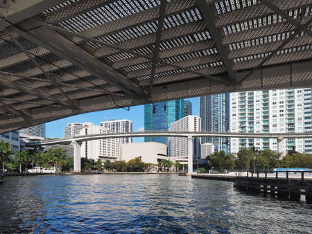 Miami, Florida 03-01-2019 The Miami River and surrounding residential and commercial buildings on a clear and sunny March afternoon.のeditorial素材