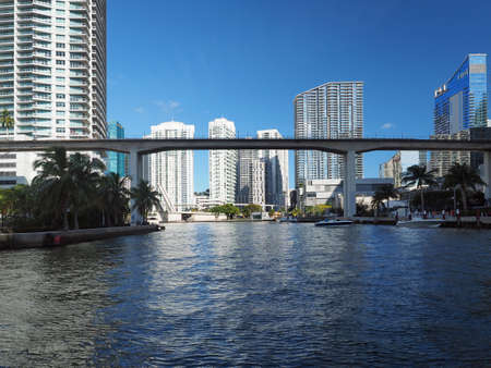 Miami, Florida 03-01-2019 The Miami River and surrounding residential and commercial buildings on a clear and sunny March afternoon.のeditorial素材