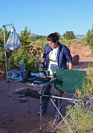 Grand Canyon National Park, Arizona 06-17-2019 Young woman enjoys remote backcountry camp in the Tuweep Campground.のeditorial素材