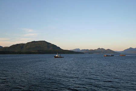 Sunset over the tranquil water of the Inside Passage, Alaska.