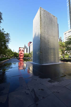 Chicago, Illinois 08-09-19 Crown Fountain video sculture by Jaume Plensa and reflection in Millennium Park on cloudless early summer morning.のeditorial素材