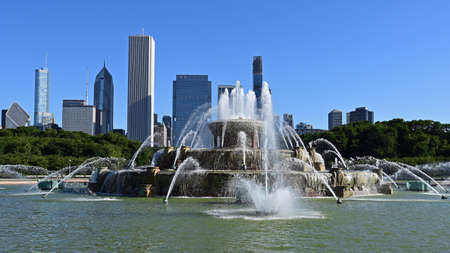 Chicago, Illinois - August 9, 2019 - Buckingham Fountain and Chicago skyline from Grant Park on a clear summer morning.のeditorial素材