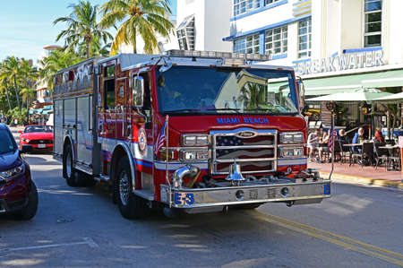 Miami Beach, Florida - January 5, 2020: Brightly colored Miami Beach Fire Department fire engine on...