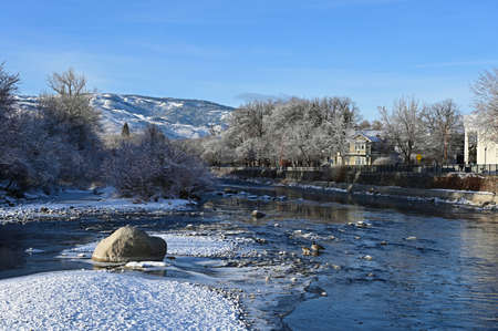 Reno, Nevada - January 17, 2020: Truckee River and Wingfield Park in early morning after snowstorm.