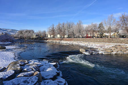 Reno, Nevada - January 17, 2020: Truckee River and Wingfield Park in early morning after snowstorm.