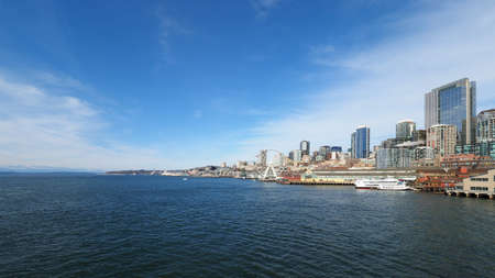 Seattle, Washington - February 10, 2018 - Skyline of city of Seattle from Seattle - Bainbridge Island ferry on sunny winter afternoon.のeditorial素材