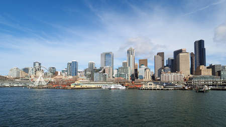 Seattle, Washington - February 10, 2018 - Skyline of city of Seattle from Seattle - Bainbridge Island ferry on sunny winter afternoon.のeditorial素材