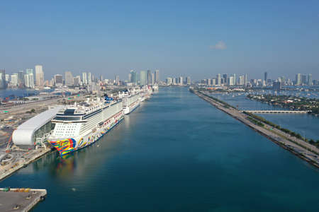 Miami, Florida - April 18, 2020 - Aerial view of cruise ships at Port Miami cruise terminal during covid-19 pandemic on sunny cloudless April morning.のeditorial素材
