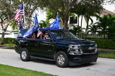 Miami, Florida - November 1, 2020 - Supporters of President Donald Trump parade in cars and trucks...