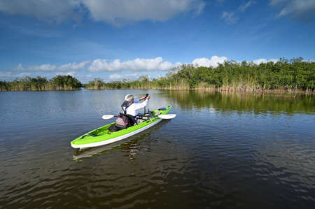Active senior kayaking on Nine Mile Pond in Everglades National Park, Florida.,のeditorial素材
