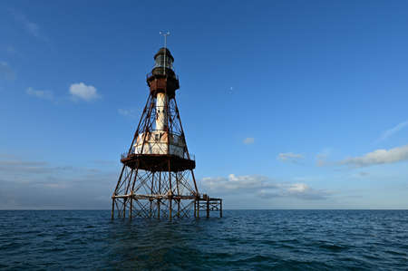 Fowey Rocks Light in Biscayne National Park off Miami, Florida on clear summer morning.の写真素材
