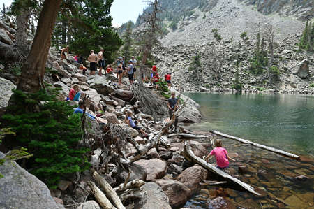 Rocky Mountain National Park, Colorado - July 26, 2021 - Visitors hike on crowded Emerald Lake Trail on sunny summer morning.のeditorial素材