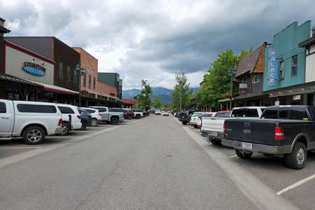 Whitefish, Montana - 6-19-2022 - Street scene of citys downtown commercial and entertainment district.のeditorial素材