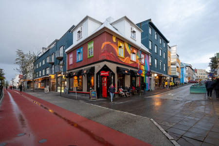 Reykjavik, Iceland - September 3, 2023 - Colorful street scene showing characteristic corrugated iron building construction under autumn cloudscape.のeditorial素材